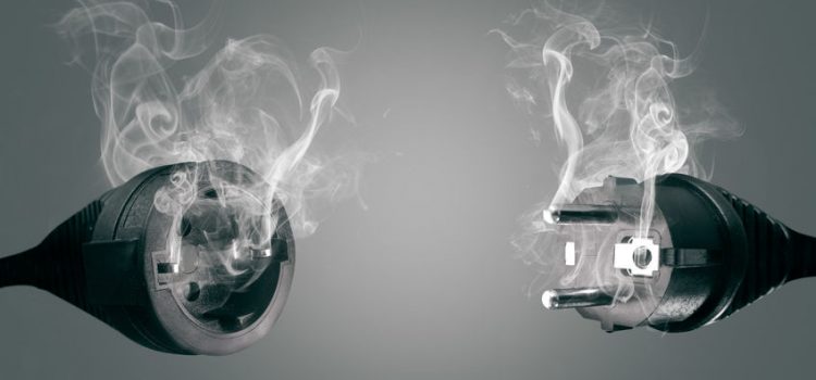 Garage-to-Grid: EV Charging in Parking Garages Smoking power plug and socket